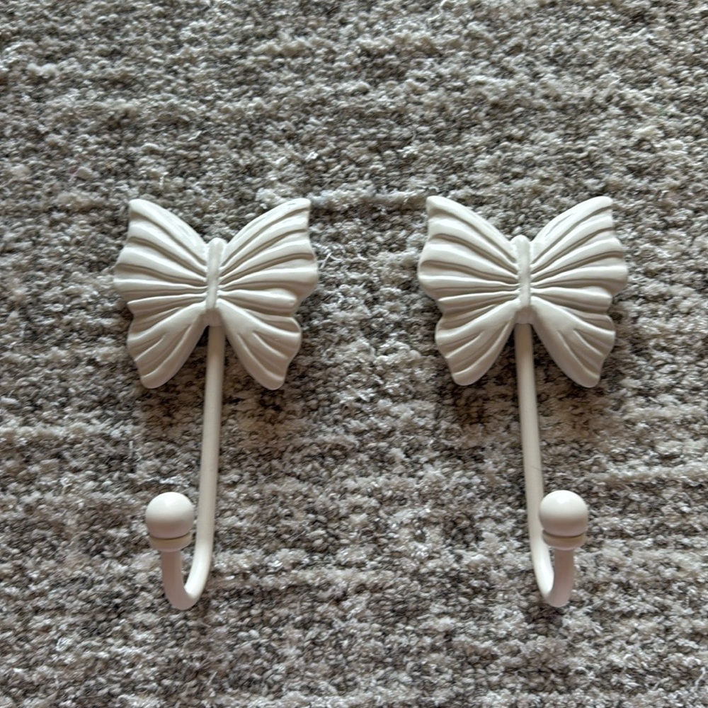 2 white butterfly hooks